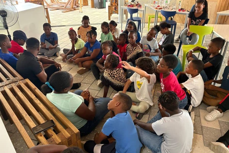 2025 cohort in a group discussion circle